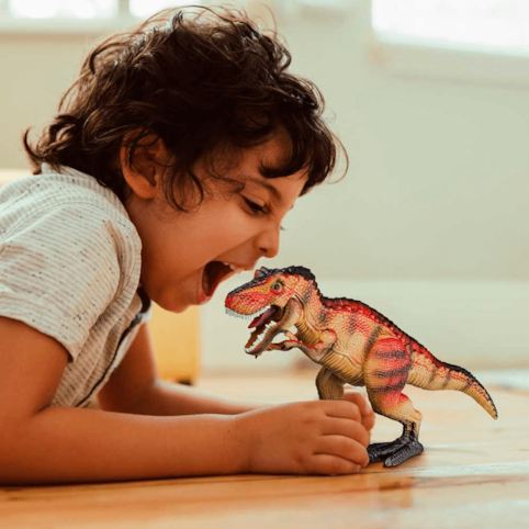 Dinossauro Tiranossauro Rex de Brinquedo com Mini Jaula